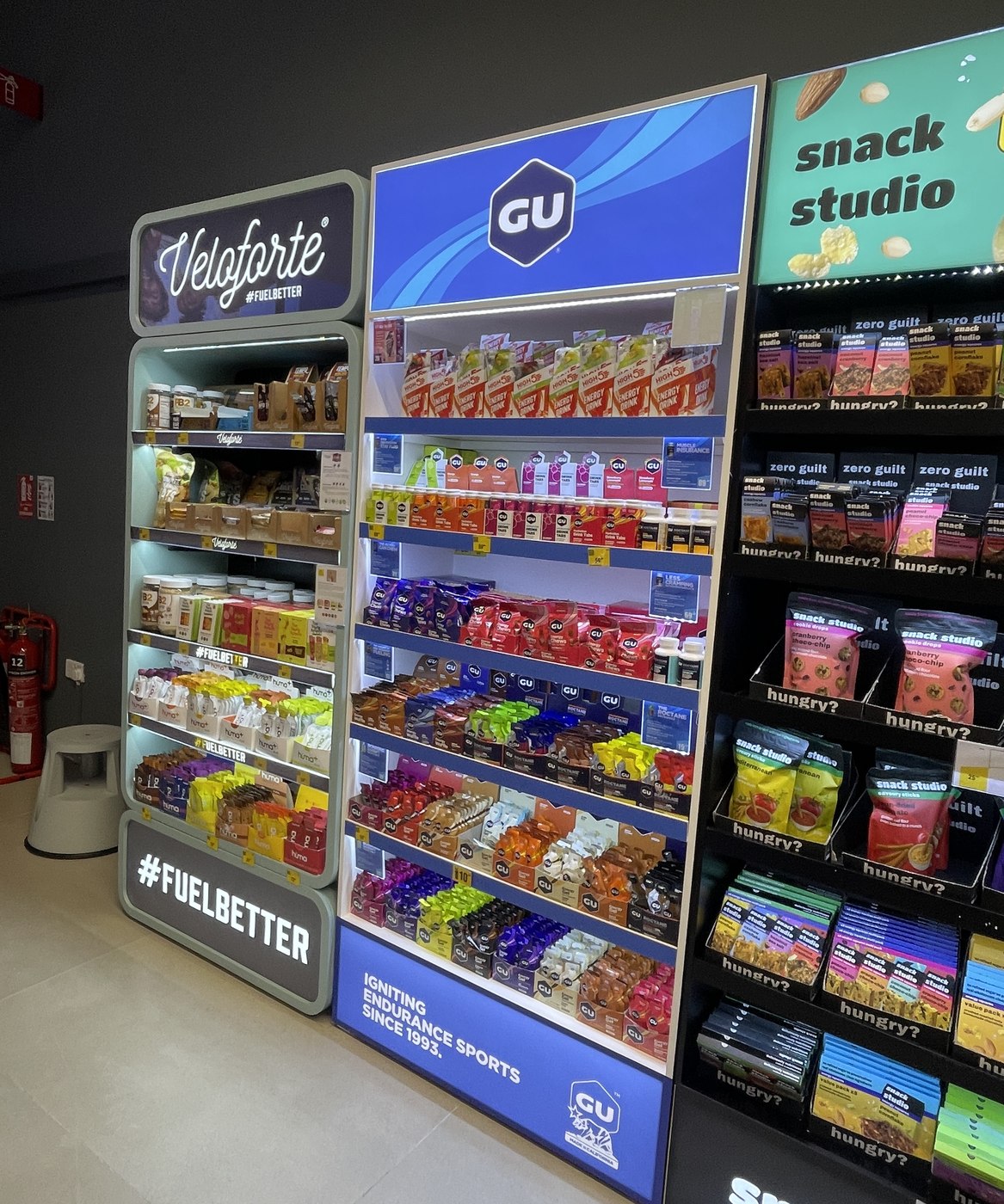 GU nutrition stand with lightbox branding at Decathlon UAE