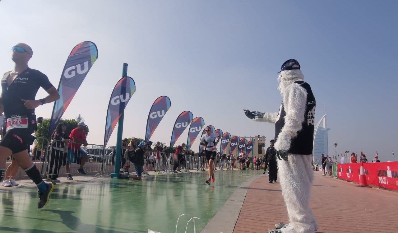 Salty the Yeti, the GU mascot, greeting runners at Ironman 70.3 Dubai